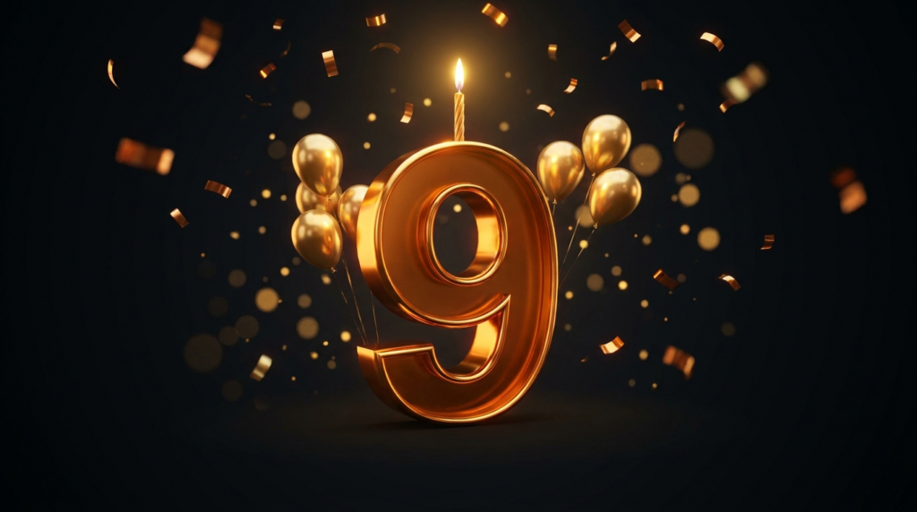 Giant glossy gold number 9 with a lit birthday candle, gold balloons and confetti on a dark charcoal background