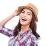 Smiling woman in a brown hat and plaid shirt, facing the camera against a white background, ideal for web design themes.